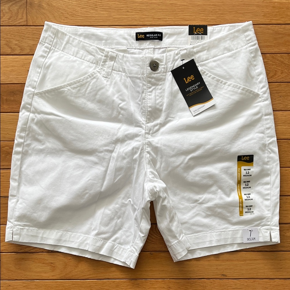 White mid rise and length walking shorts